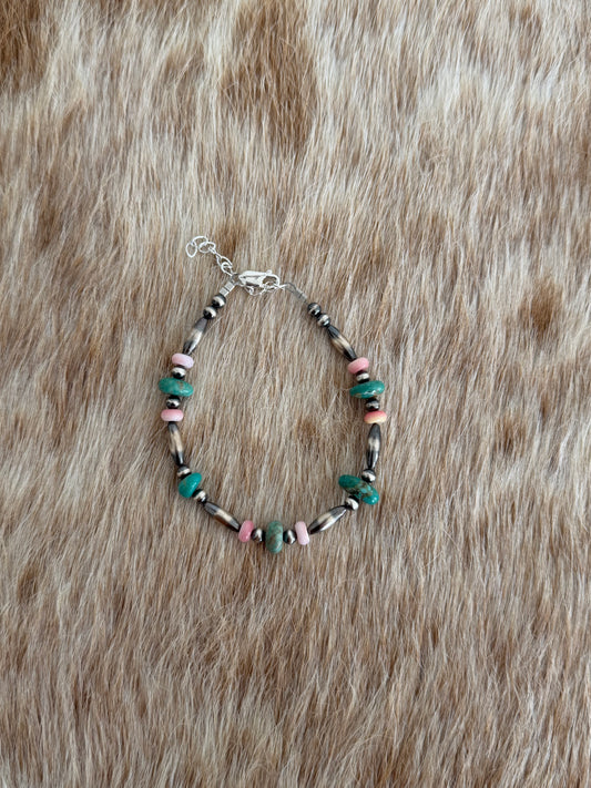7.75" Turquoise and Pink Conch Bracelet
