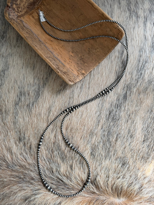 60" LONG 4-8mm Graduated Sterling Pearl Necklace