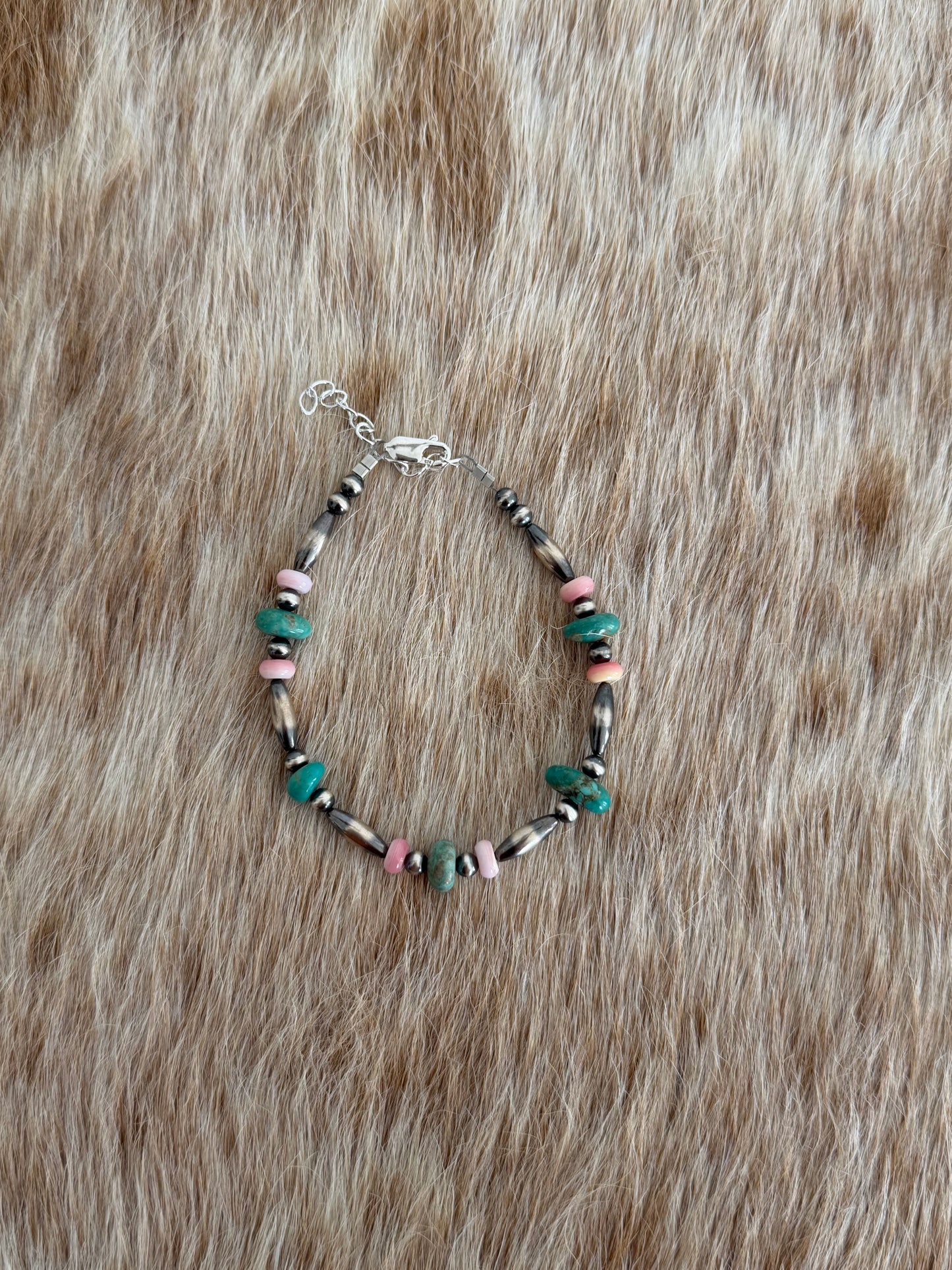 7.75" Turquoise and Pink Conch Bracelet